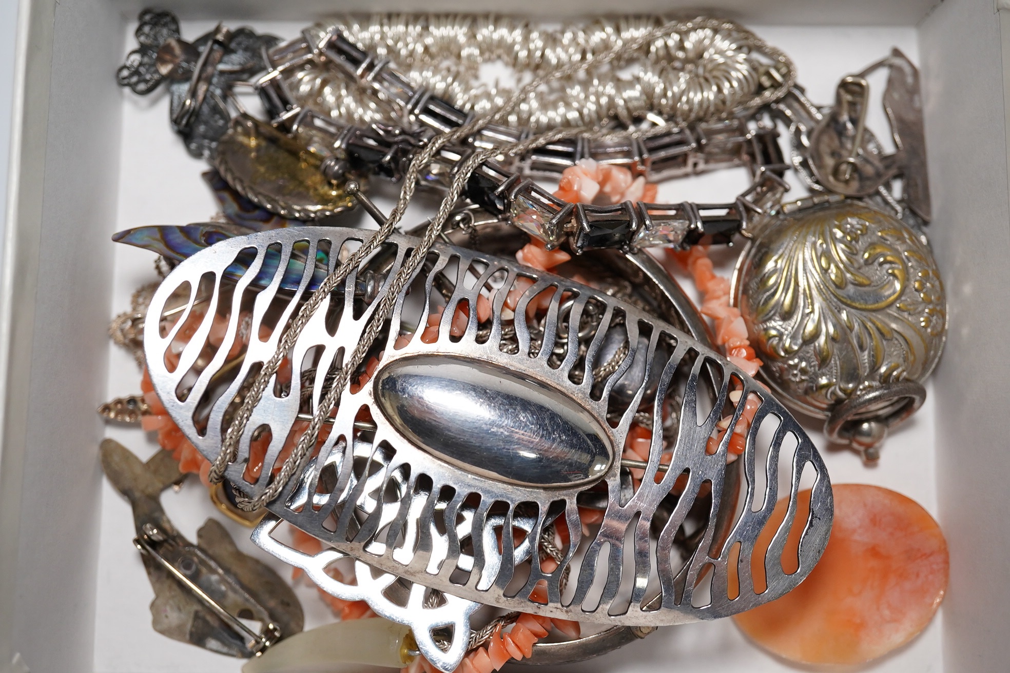 Assorted silver and jewellery including hinged bangle, pendants, brooches etc. Condition - poor to fair